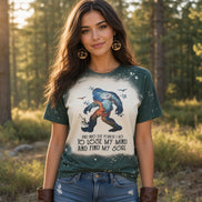 Nwdesigns3 Sasquatch Into the Forest I Go graphic tee, casual top with forest and Sasquatch design on soft fabric.