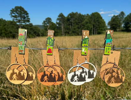 Wooden Bigfoot earrings by Krafty Supply featuring detailed carved Sasquatch design on natural wood.