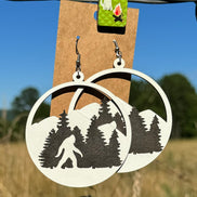Handcrafted wooden Bigfoot earrings by Krafty Supply featuring detailed, natural wood finish and playful Bigfoot silhouette design.