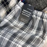 American Recycled Clothing flannel pants featuring a cozy, plaid design and relaxed fit for comfortable casual wear.