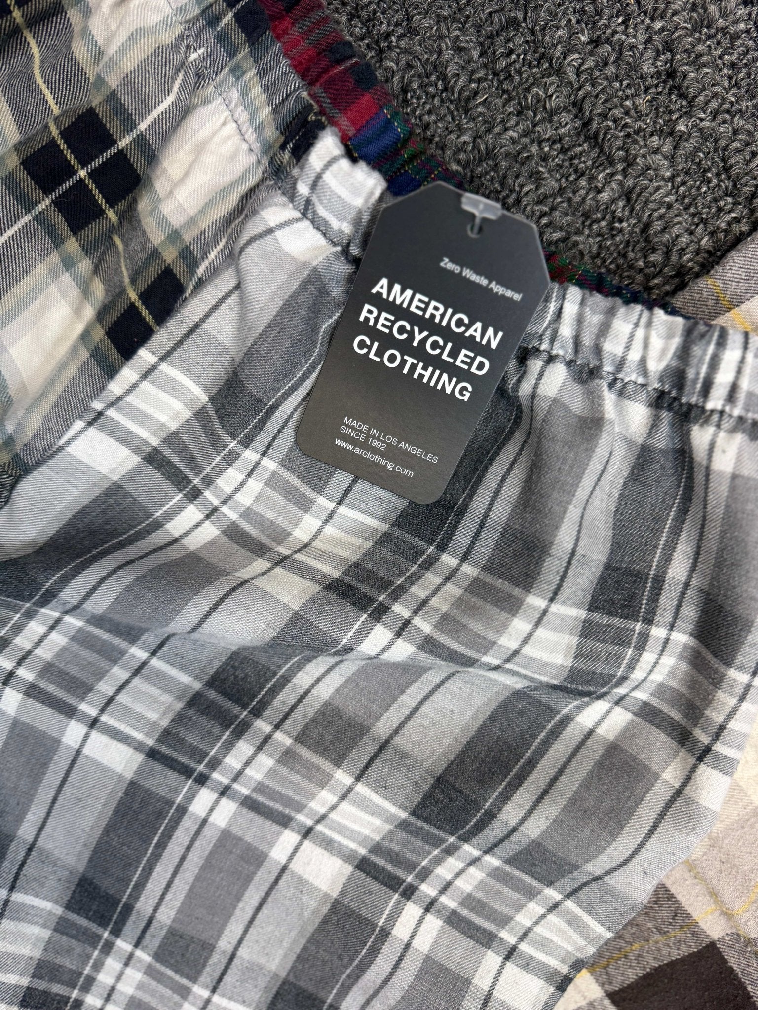 American Recycled Clothing flannel pants featuring a cozy, plaid design and relaxed fit for comfortable casual wear.