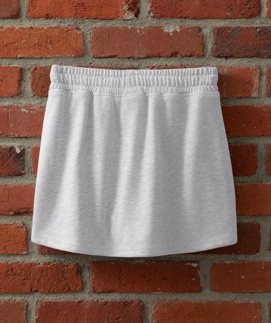 Aapparella mini French Terry skort featuring a comfortable, casual design with a soft fabric and stylish front slit detail.