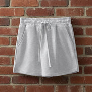 Aapparella mini French terry skort with a comfortable elastic waistband and a stylish, casual design in soft fabric.