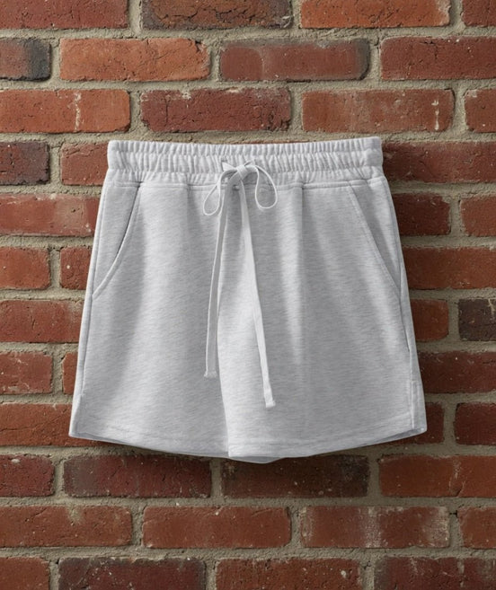 Aapparella mini French terry skort with a comfortable elastic waistband and a stylish, casual design in soft fabric.
