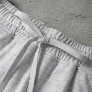 Aapparella mini French terry skort featuring a soft, stretchy fabric with a relaxed fit and a comfortable elastic waistband.