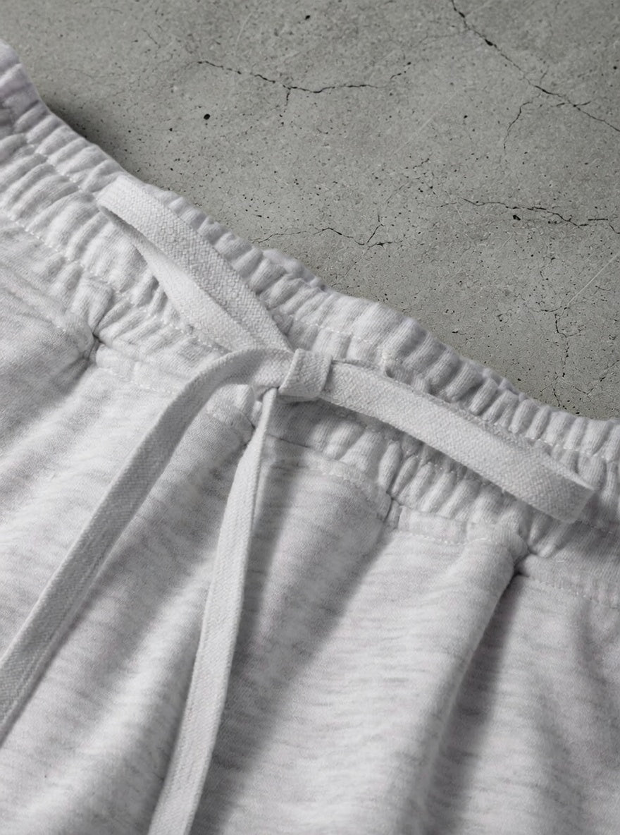 Aapparella mini French terry skort featuring a soft, stretchy fabric with a relaxed fit and a comfortable elastic waistband.