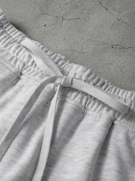 Aapparella mini French terry skort featuring a soft, stretchy fabric with a relaxed fit and a comfortable elastic waistband.