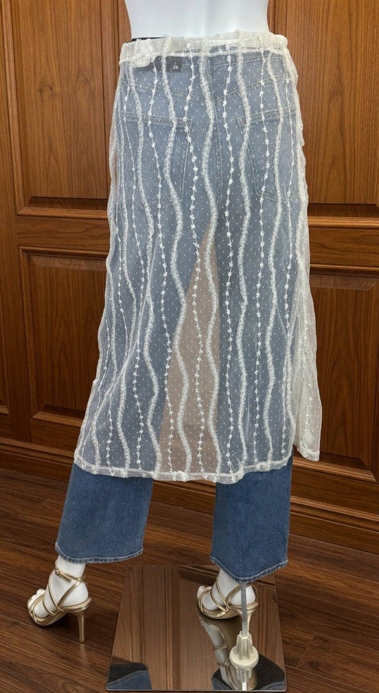 Sheer layered mesh skirt by ADORA LA with flowing, see-through fabric and stylish layered design.