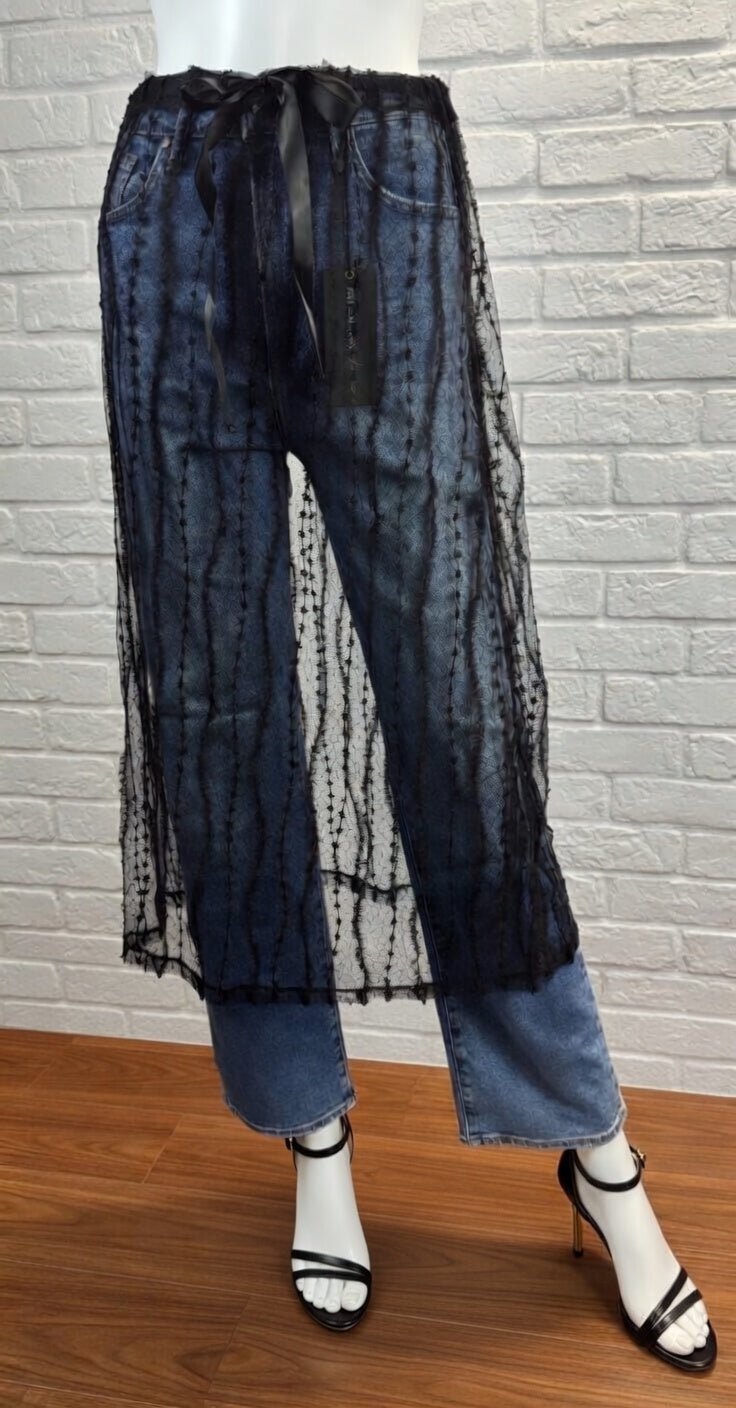 Sheer layered mesh skirt by ADORA LA featuring a lightweight, flowy design with multiple mesh tiers and a stylish, modern look.