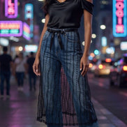 Sheer layered mesh skirt by ADORA LA featuring a flowy, see-through design with multiple mesh layers for a trendy, stylish look.