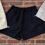 Khaki wide-leg cargo shorts by ADORA LA, featuring relaxed fit, multiple pockets, and casual style for comfortable summer wear.