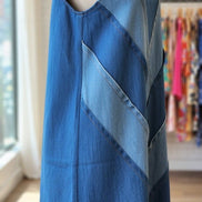 ADORA LA color block denim dress featuring a stylish patchwork design and classic fit, perfect for casual and trendy outfits.