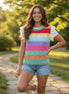 Multicolored crochet top with eyelet sleeves by ADORA LA, showcasing intricate knit pattern and vibrant multicolor design.