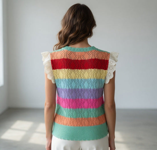 Multi-colored crochet top with eyelet sleeves by ADORA LA, featuring a stylish and vibrant design.