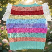Multi-colored crochet top with eyelet sleeves by ADORA LA, featuring a stylish and vibrant design.