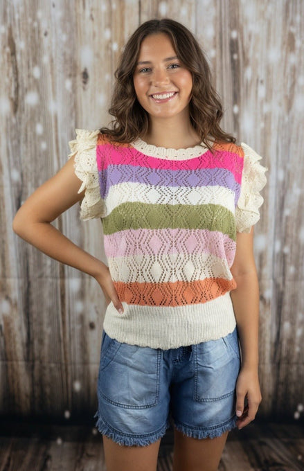 Multicolor crochet top with eyelet sleeve detail by ADORA LA, featuring a stylish and vibrant design.