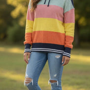 Multi-color hoodie sweater by ADORA LA featuring a cozy, vibrant design with a front pocket and adjustable drawstrings.