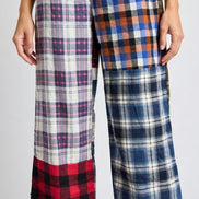American Recycled Clothing men's flannel pants in size small, soft plaid fabric with a relaxed fit and elastic waistband.