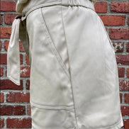 Small faux leather shorts from And The Why featuring a sleek black design and stylish fit.