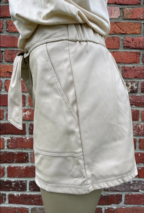 Small faux leather shorts from And The Why featuring a sleek black design and stylish fit.