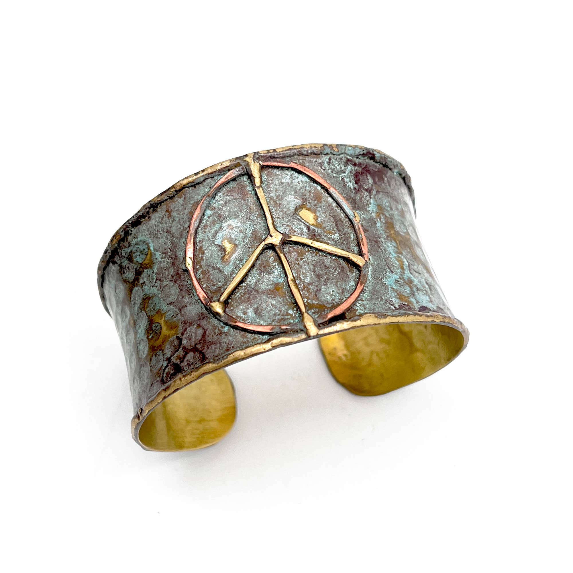 Brass patina cuff bracelet featuring a rustic blue peace sign design from Anju Jewelry, stylish boho accessory.
