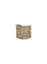 Brass patina ring by Anju Jewelry featuring a large flower design in warm brown and white tones.