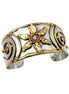 Handcrafted mixed metal cuff bracelet with a floral spiral design by Anju Jewelry, showcasing intricate metalwork and artistic detail.
