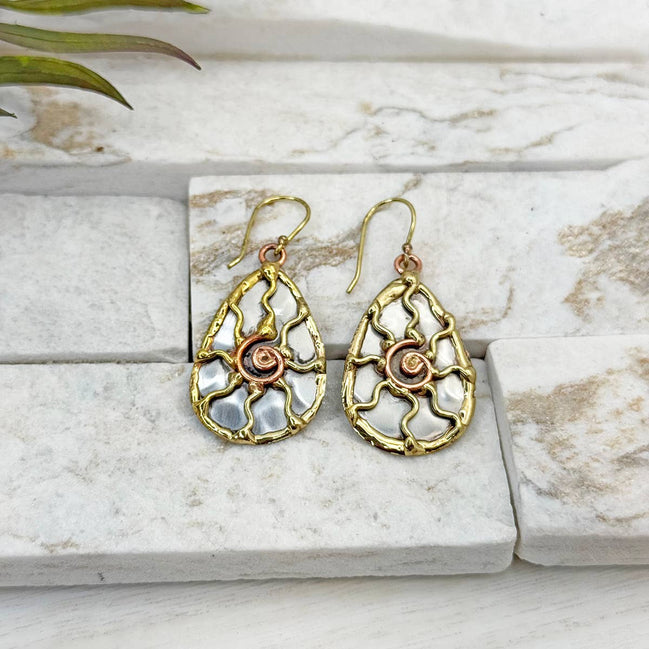 Handcrafted mixed metal sun earrings featuring detailed sunburst design by Anju Jewelry.