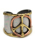 Mixed metal cuff ring by Anju Jewelry featuring layered design and sleek, modern style on a plain white background.