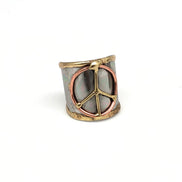 Mixed metal cuff ring by Anju Jewelry featuring a contemporary design with overlapping metal bands and a sleek finish.