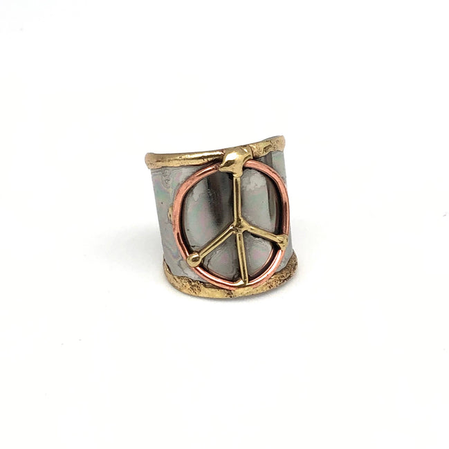 Mixed metal cuff ring by Anju Jewelry featuring a contemporary design with overlapping metal bands and a sleek finish.