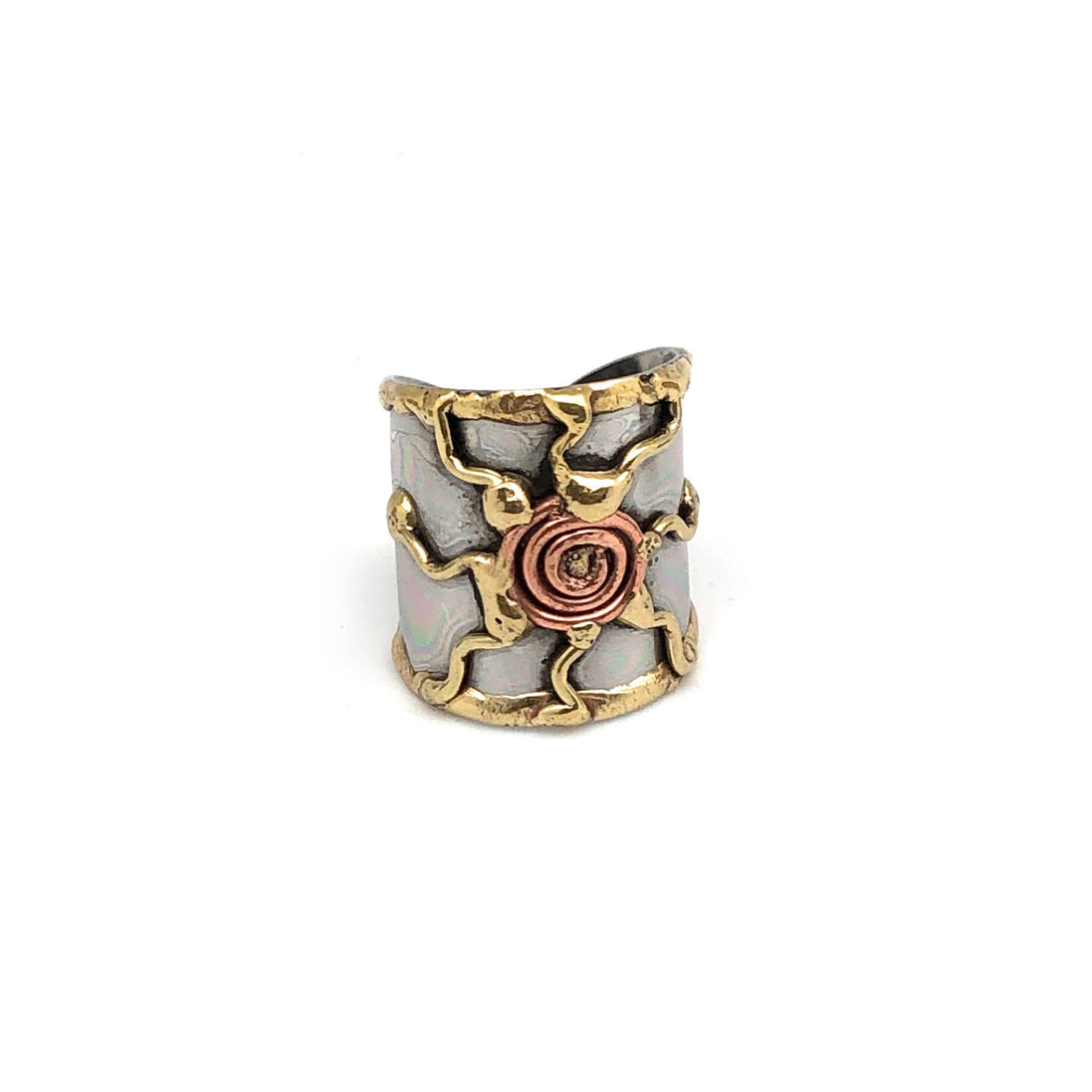 Mixed metal cuff ring by Anju Jewelry featuring a sleek, modern design with overlapping metal bands on a white background.