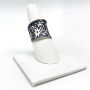 Silver Patina Ring with blue small floral design by Anju Jewelry, showcasing intricate floral jewelry craftsmanship.