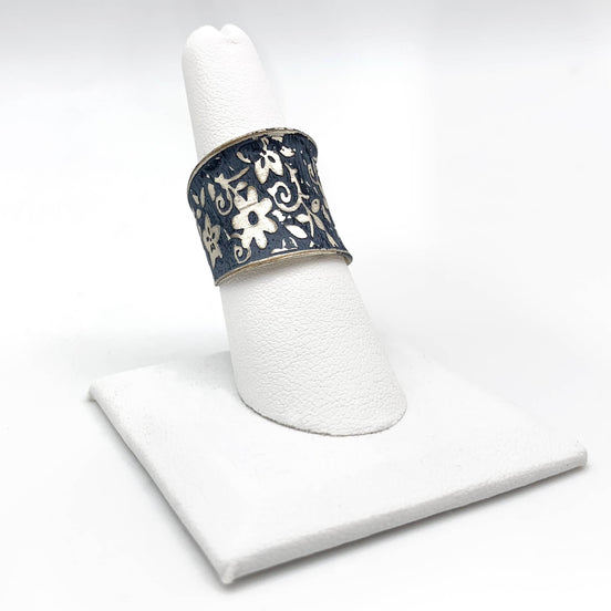 Silver Patina Ring with blue small floral design by Anju Jewelry, showcasing intricate floral jewelry craftsmanship.