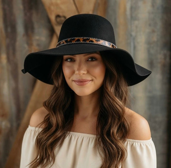 Avenue Zoe boho black felt hat with wide brim and decorative band, stylish accessory for fashion-forward outfits.