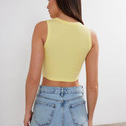 Women's cropped cotton crew neck tank top by VAV NEW YORK, casual basic sleeveless top for summer wear.