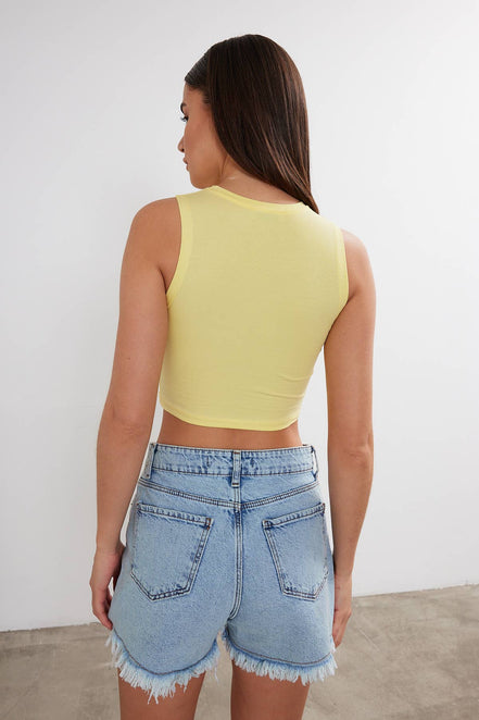 Women's cropped cotton crew neck tank top by VAV NEW YORK, casual basic sleeveless top for summer wear.