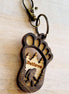 Big Foot keychain featuring a detailed Sasquatch figure, attached to a metal keyring, by The Country Roost.