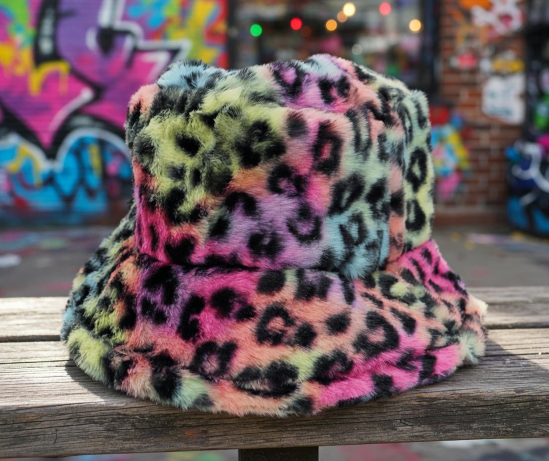 Tie dye leopard patterned faux fur bucket hat by Cap Zone with vibrant, bold animal print and soft fur texture.