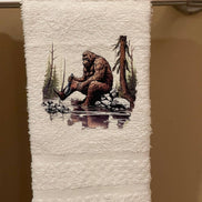 Squatchin’ Country Bathing Bigfoot 3-piece towel set with large, soft towels featuring Bigfoot prints and rustic design details.