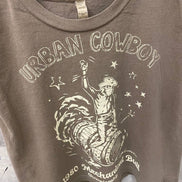 Faded brown Urban Cowboy boxy midriff muscle top with pinned sleeves, by Country Deep Apparel, styled on a hanger.