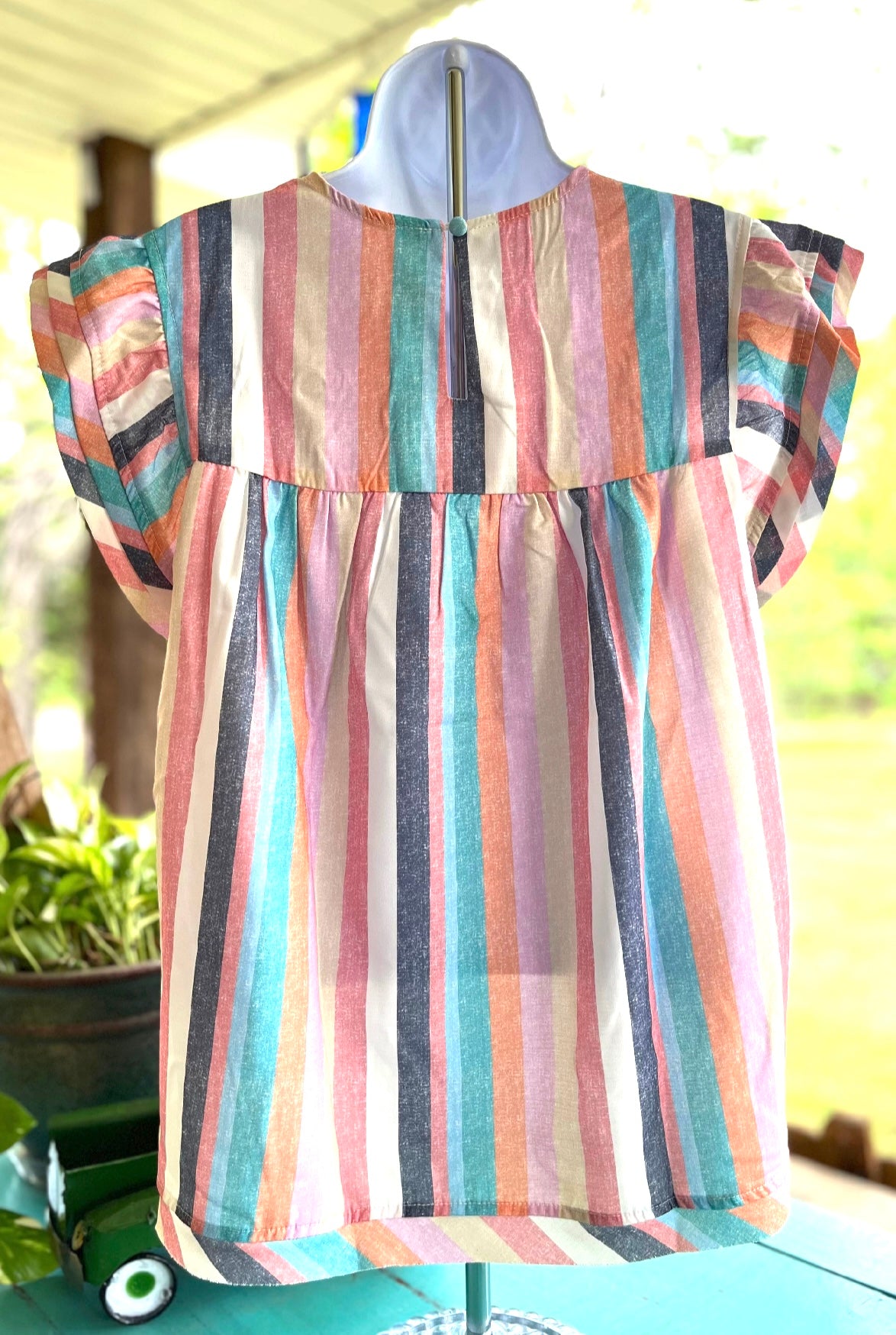 Spring Stripes shirt by Crossed Arrows Clothing Co featuring colorful striped pattern and casual fit.