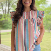 Spring Stripes shirt by Crossed Arrows Clothing Co featuring colorful striped pattern and lightweight fabric.