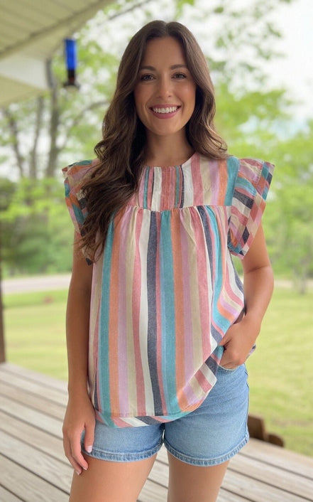 Spring Stripes shirt by Crossed Arrows Clothing Co featuring colorful striped pattern and lightweight fabric.