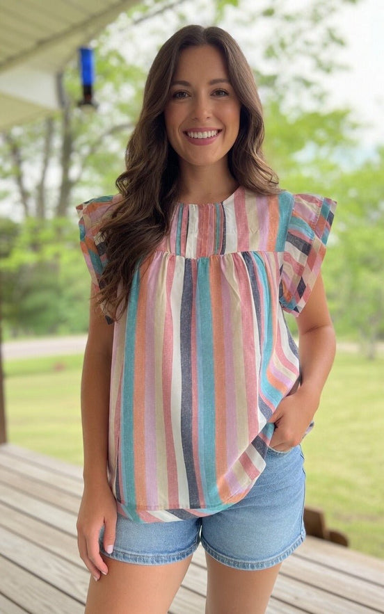 Spring Stripes shirt by Crossed Arrows Clothing Co featuring colorful striped pattern and lightweight fabric.