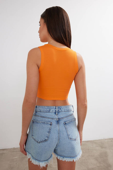 Women's cropped cotton tank top with crew neck by VAV NEW YORK, featuring a basic, fitted design perfect for casual wear.