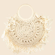 Straw braided fringe bag by Anarchy Street featuring boho style with woven straw texture and long fringe detailing.