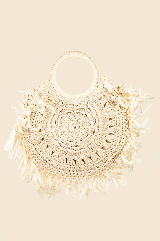 Straw braided fringe bag by Anarchy Street featuring boho style with woven straw texture and long fringe detailing.