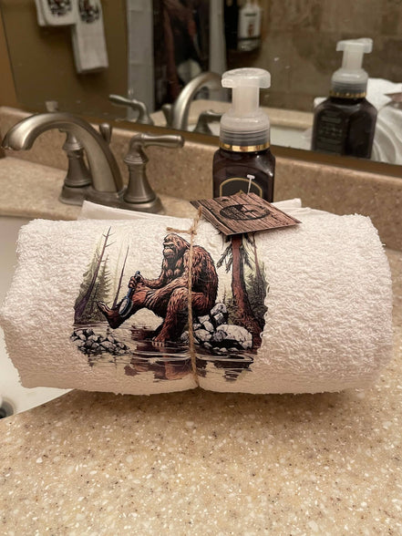 Squatchin’ Country Bathing Bigfoot 3-piece towel set with Bigfoot-themed designs in soft, absorbent fabric for bathroom use.