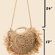 Straw braided fringe bag by Anarchy Street featuring a boho style with woven texture and hanging fringe details.